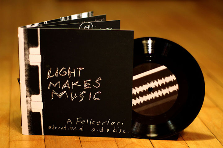 7" record and bound sleeve